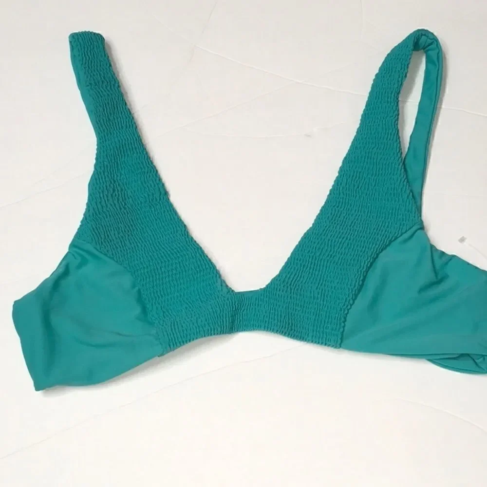 Smocked seafoam green bikini top. NWOT